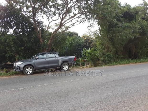 Two Acres By Main Dodowa Ayikuma Road · Photo 1