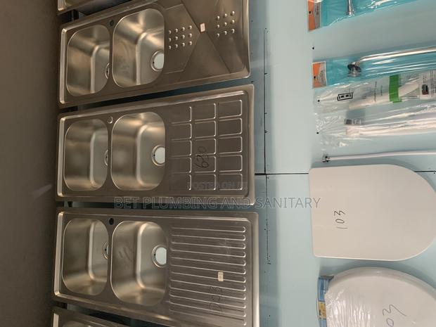 Two Bowl One Arm Block and Cabinet Sink_complete_kitchen Sink · Photo 1