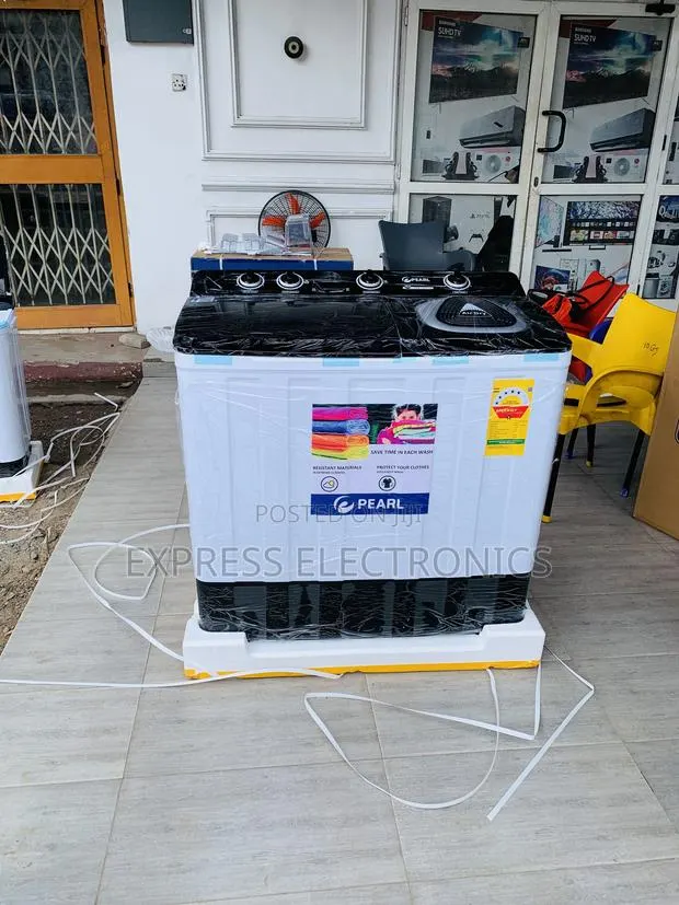 Purchase 12kg Topload Twintub Semi Automatic White · Photo 1