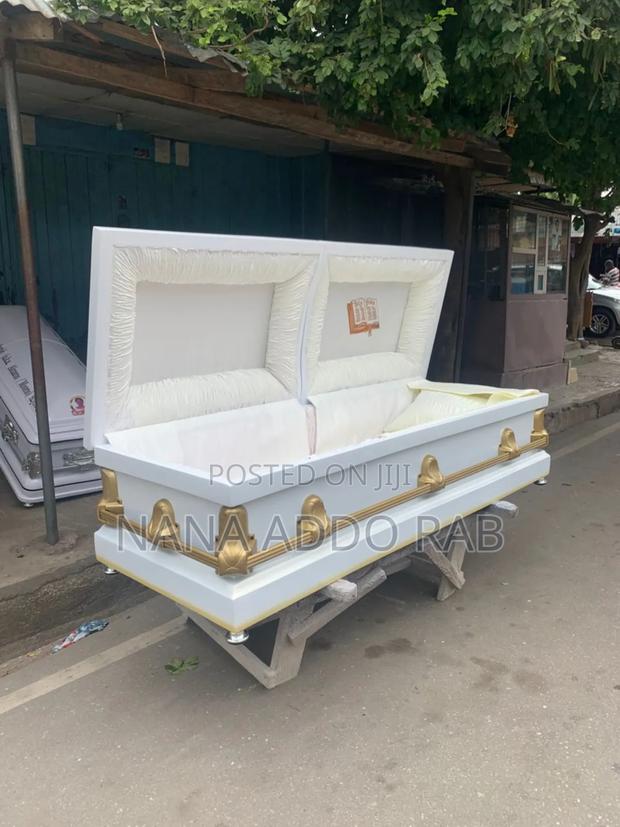 Original Ghana Made Casket .White With Gold Shade on Top of the Casket · Photo 5