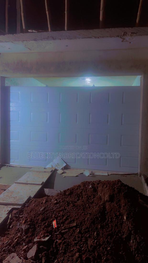 Automatic Garage Door System · Photo 1