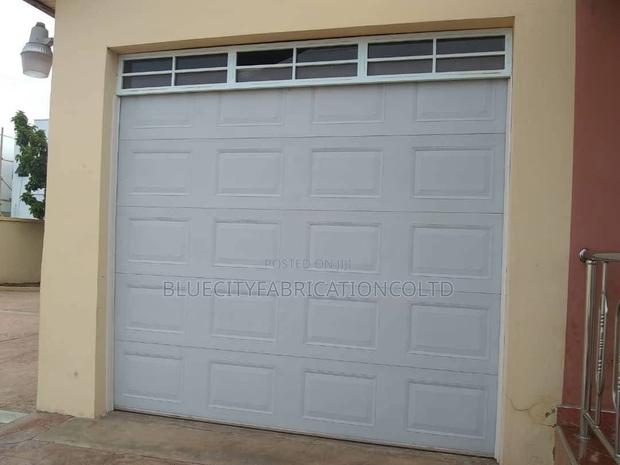 Garage Door Automatic and Manual System · Photo 1