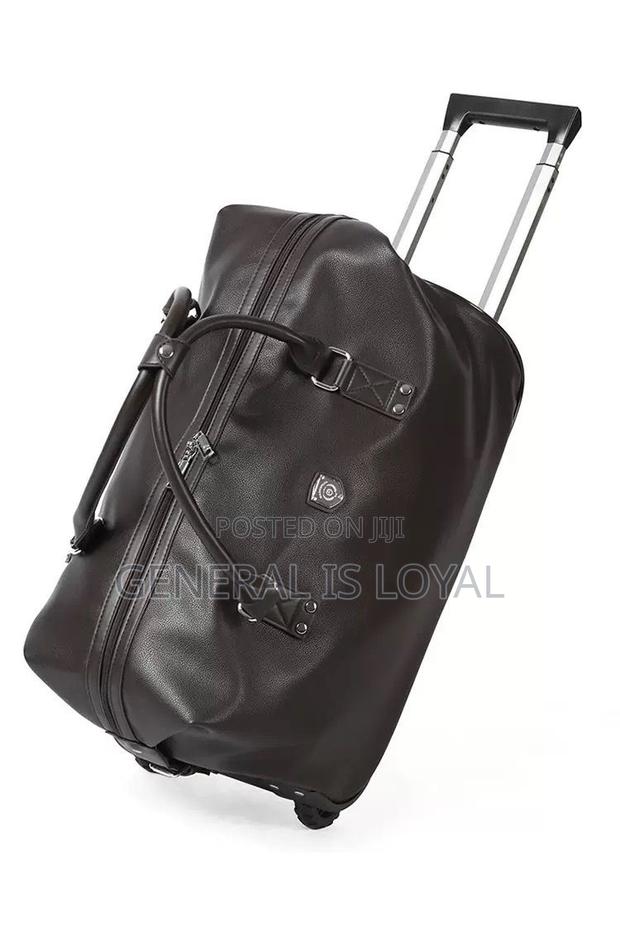 Genuinely Leather Duffel Trolley Bag · Photo 1