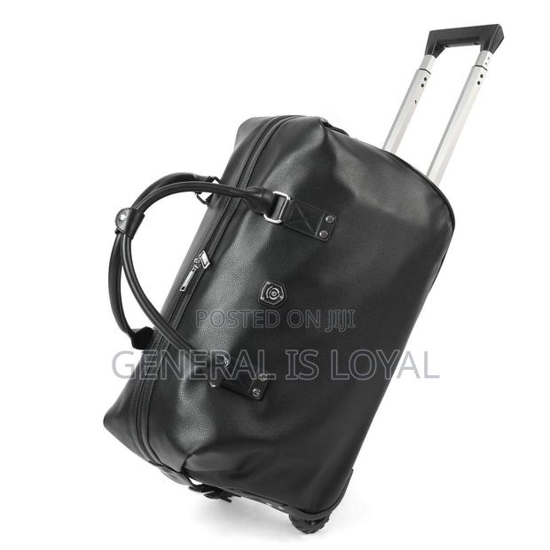 Genuinely Leather Duffel Trolley Bag · Photo 5
