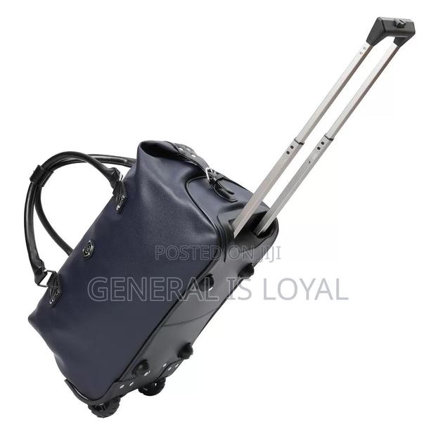 Genuinely Leather Duffel Trolley Bag · Photo 7