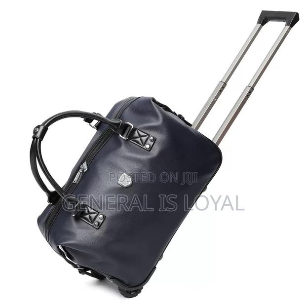 Genuinely Leather Duffel Trolley Bag · Photo 6