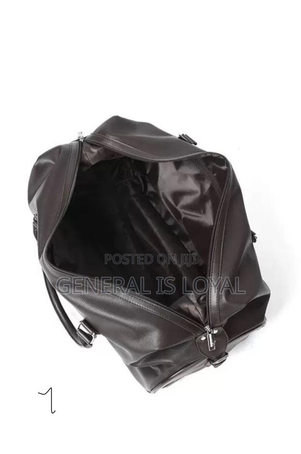 Genuinely Leather Duffel Trolley Bag · Photo 2