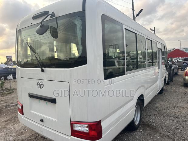 New Toyota Coaster 2024 White · Photo 6