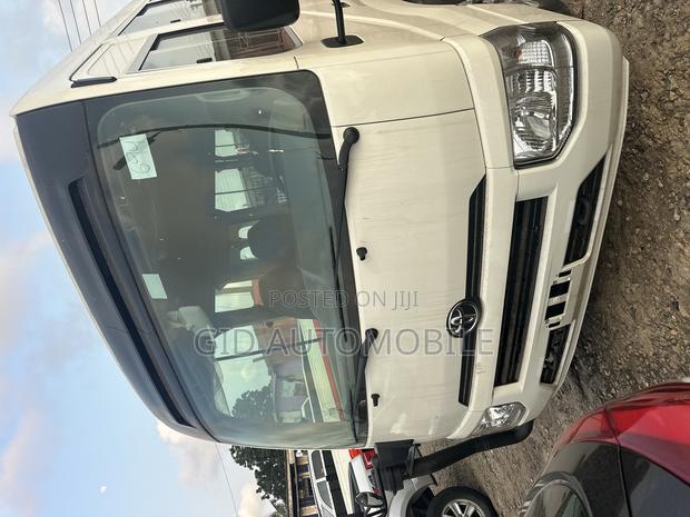 New Toyota Coaster 2024 White · Photo 5