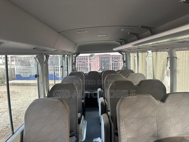 New Toyota Coaster 2024 White · Photo 8