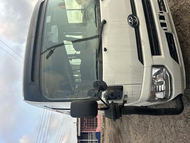 New Toyota Coaster 2024 White · Photo 7