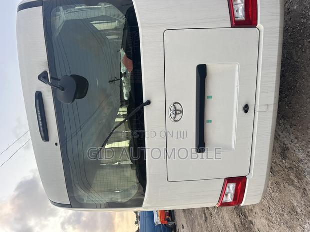 New Toyota Coaster 2024 White · Photo 3