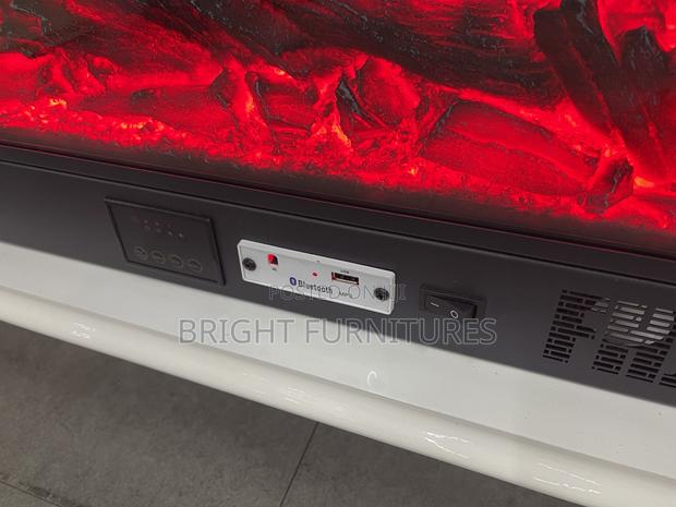 Electric Glass Top Wooden Tv Stand · Photo 7