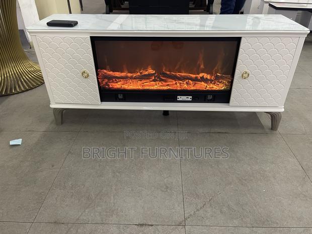 Electric Glass Top Wooden Tv Stand · Photo 1