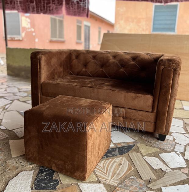 Brown 2in1 Sofa + Coffee Table · Photo 1