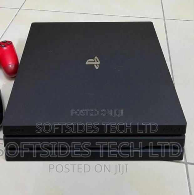 Home Used Playstation 4 Pro With Controller and 1tb Storage · Photo 3
