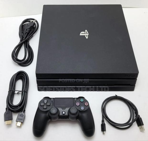 Home Used Playstation 4 Pro With Controller and 1tb Storage · Photo 1