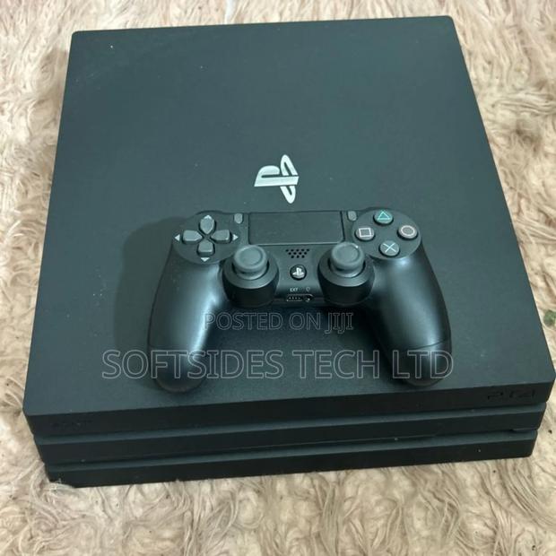 Home Used Playstation 4 Pro With Controller and 1tb Storage · Photo 4