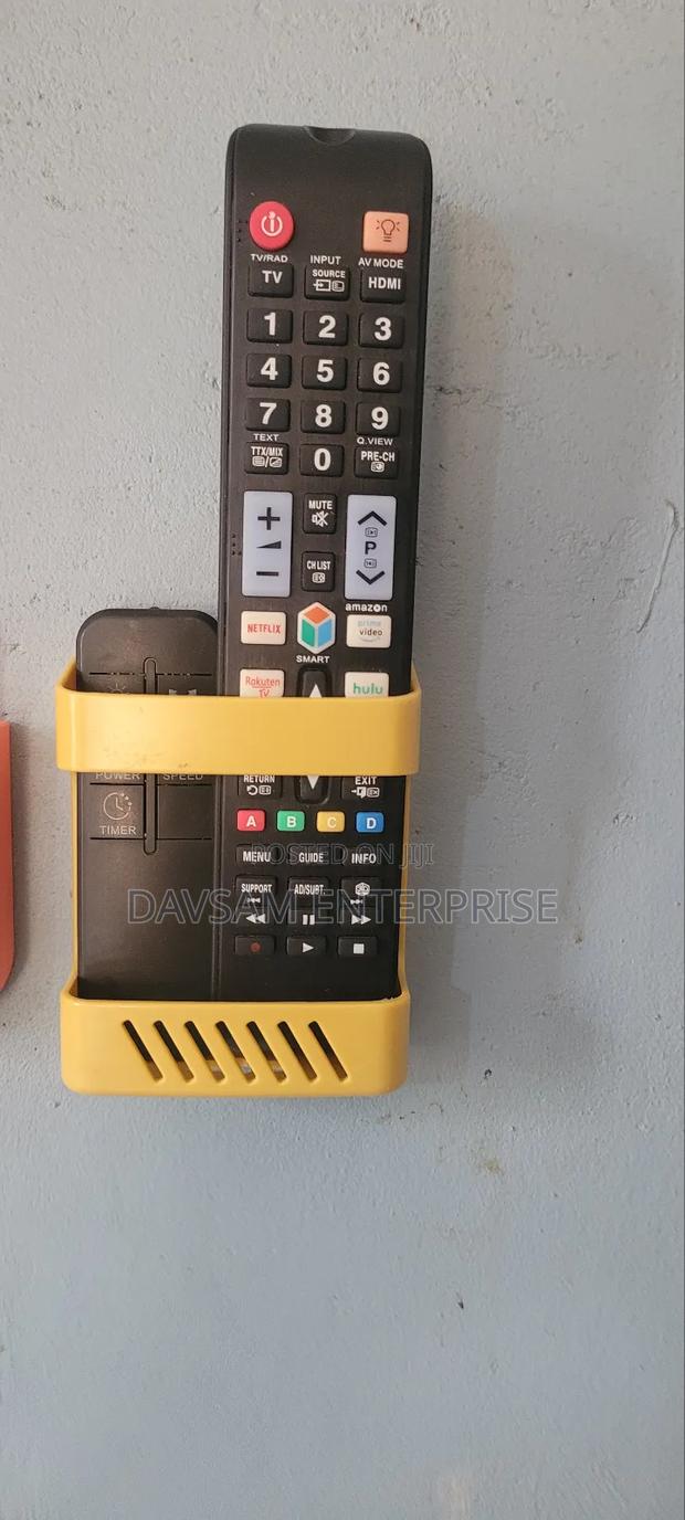 Remote and Phones Holders · Photo 1