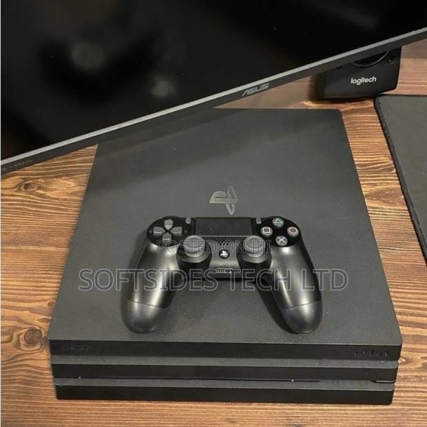 Black Sony Ps4 Pro or Playstation 4 Pro With 15 Hot Games Installed · Photo 2
