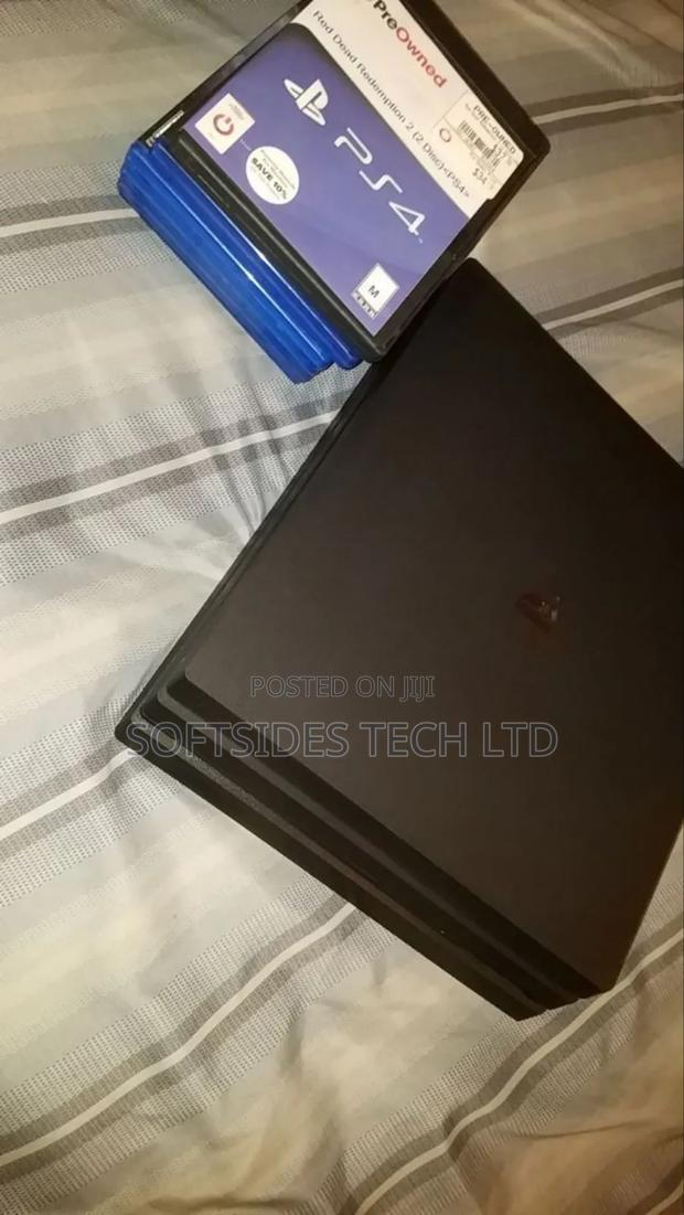 Black Sony Ps4 Pro or Playstation 4 Pro With 15 Hot Games Installed · Photo 4