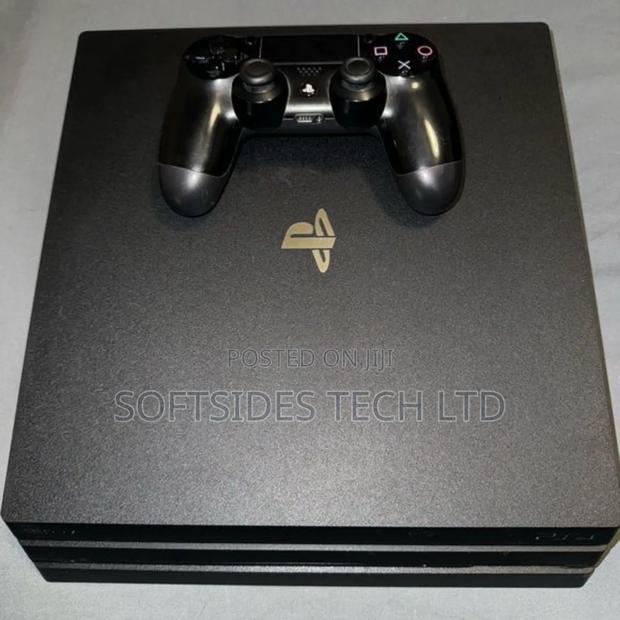 Black Sony Ps4 Pro or Playstation 4 Pro With 15 Hot Games Installed · Photo 1