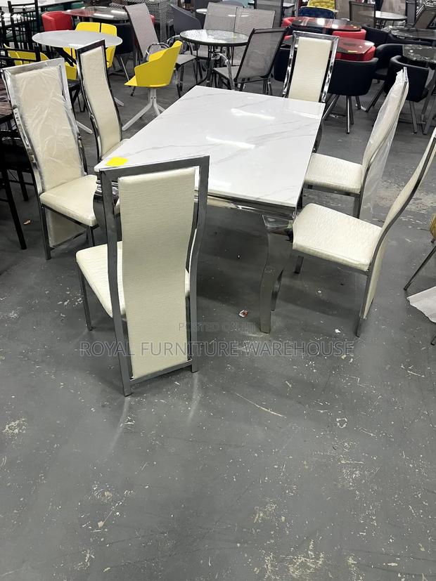 6 Seater and Glossy Marble Dining Set · Photo 1