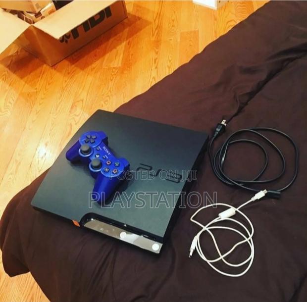 Playstation 3 Slim · Photo 2