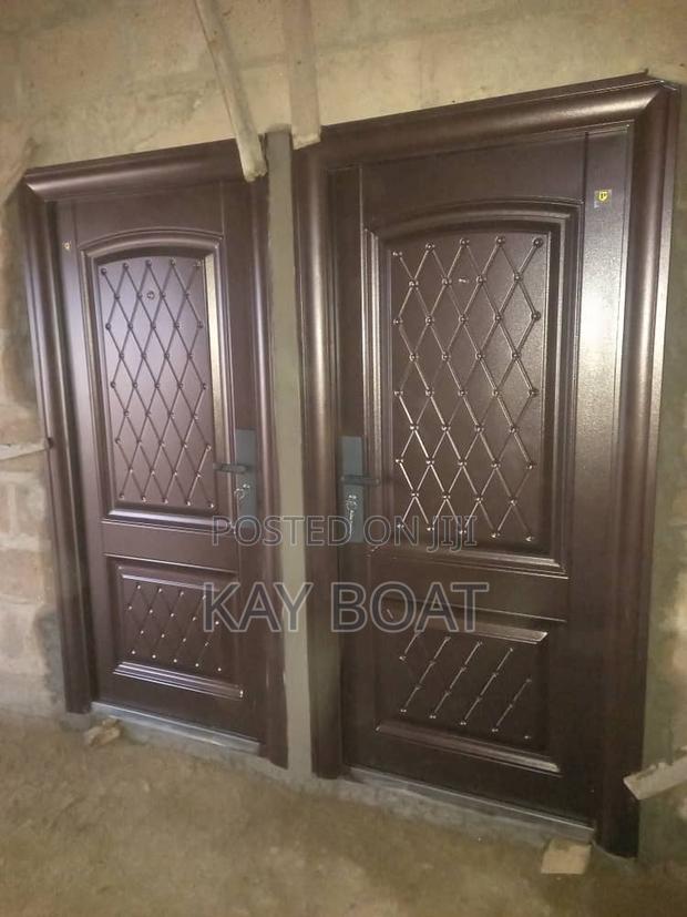 Neatly Installed 2 Singles Doors · Photo 1