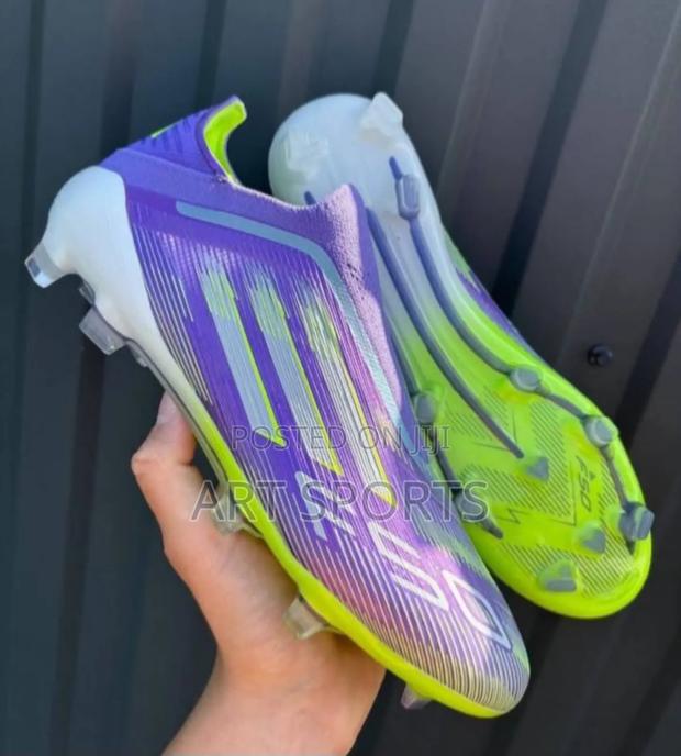 F50 Elite Laceless Firm Ground Boots · Photo 1