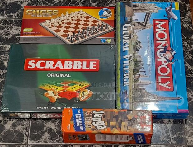 4-in-1 Game Set – Scrabble, Chess, Monopoly Jenga · Photo 1