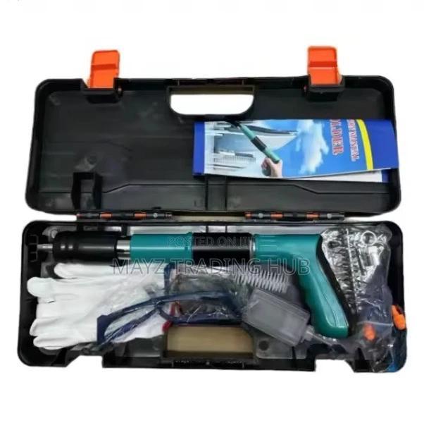 Nail Gun With Nails,Gloves And Googles · Photo 1