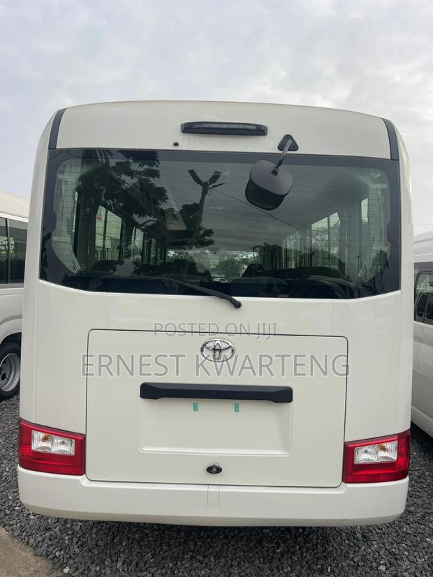 New Toyota Coaster 2025 White · Photo 3