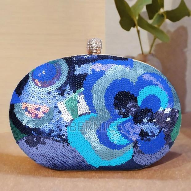 Sequined Floral Clutch · Photo 1