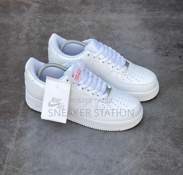 Nike Air Force 1 All White Sneaker · Photo 1