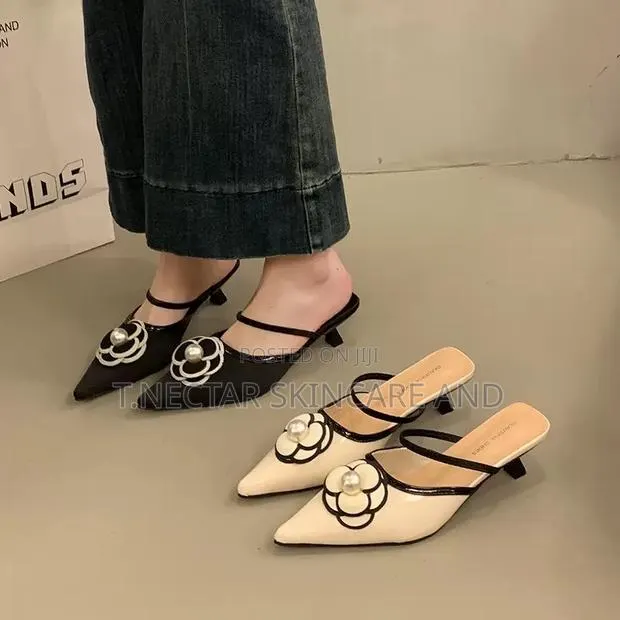 Elegant Floral Pointed-Toe Slingback Heels · Photo 1