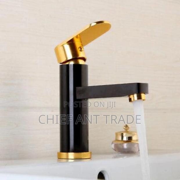 Basin Tap Faucet. Black Gold · Photo 1