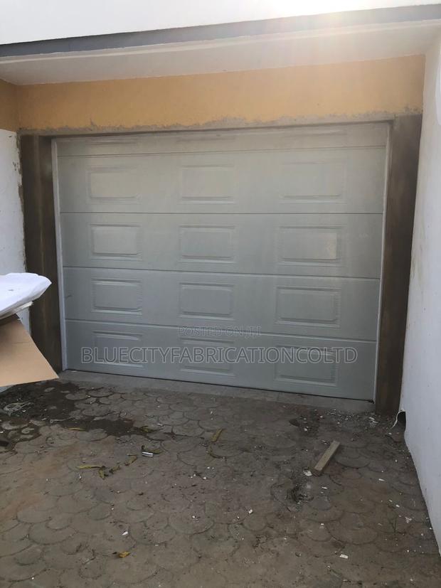 Double Panel Garage Doors for Sale in Ghana · Photo 1