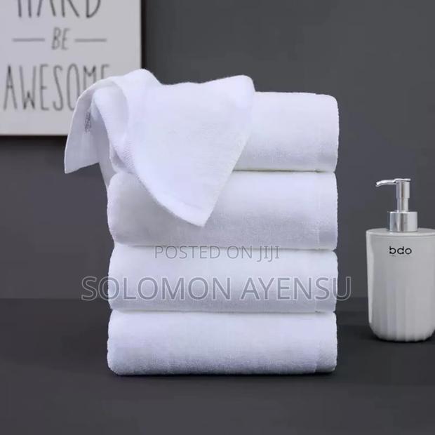 White Cotton Towels Available in 2 Different Sizes · Photo 1