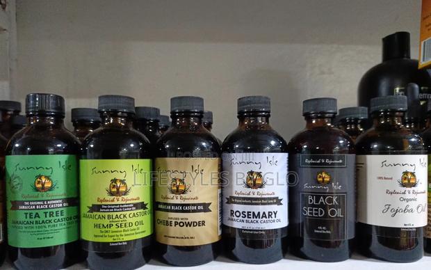 Sunny Isle Jamaican Black Castor With Rosemary, Hemp, Jojoba, Tea Tree · Photo 1
