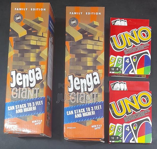 Two Uno Card Games Two Jenga Wooden Games. · Photo 1
