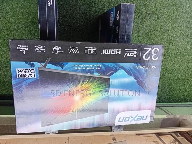 Smile Together With You Lovely Ones Nexon 32inches Digital Tv · Photo 1