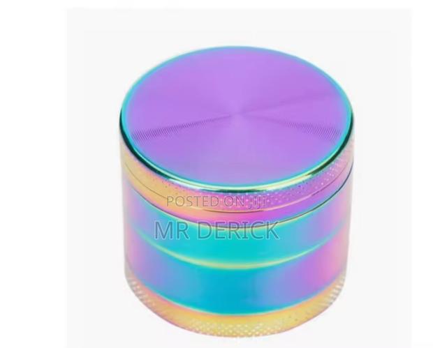 Rainbow Mini 40mm 4 Layers Dry Herb Grinder or Crusher Metal Zincalloy · Photo 1