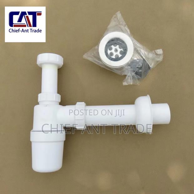 Waste Bottle Trap · Photo 1