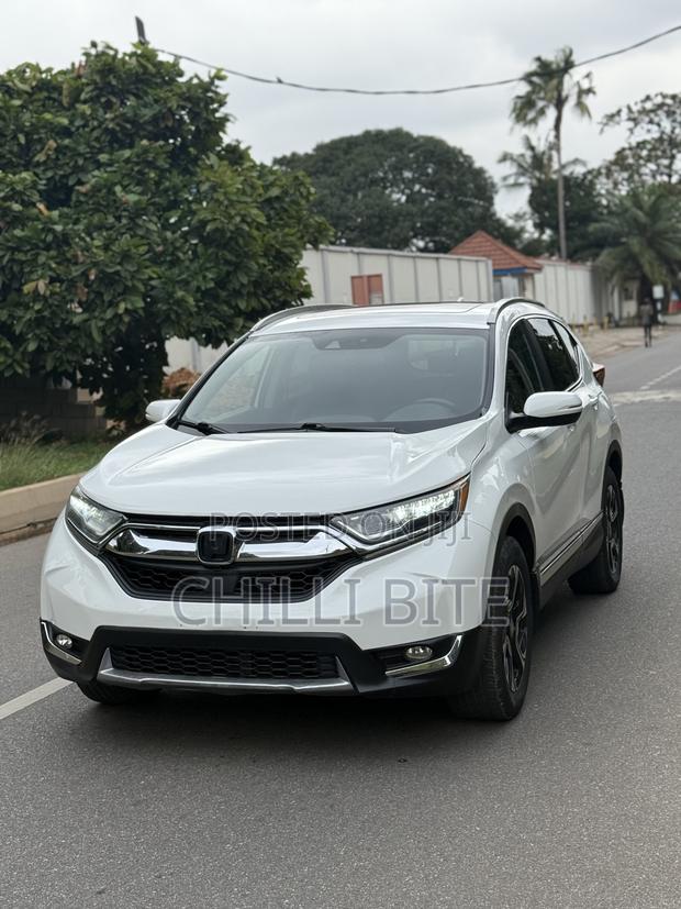 Honda CR-V Touring 4dr SUV AWD (1.5L 4cyl CVT) 2017 White · Photo 2