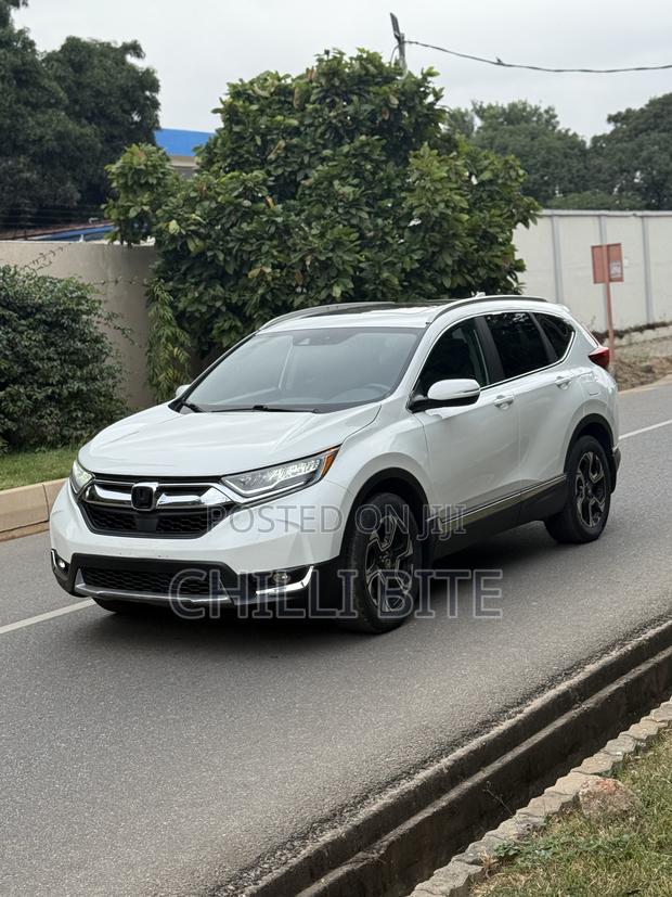 Honda CR-V Touring 4dr SUV AWD (1.5L 4cyl CVT) 2017 White · Photo 4