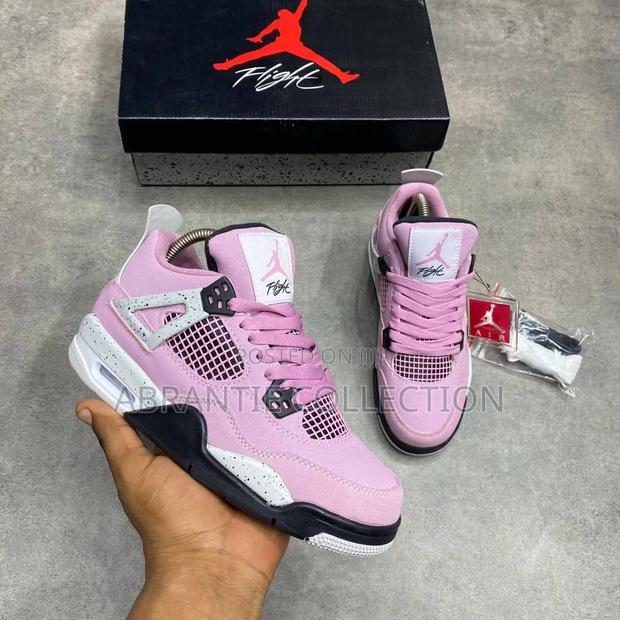 Air Jordan Retro 4 Orchid · Photo 2