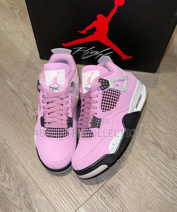 Air Jordan Retro 4 Orchid · Photo 1
