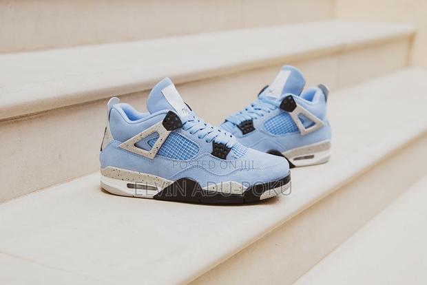 Air Jordan 4 Retro “ University Blue “ Sneakers · Photo 2