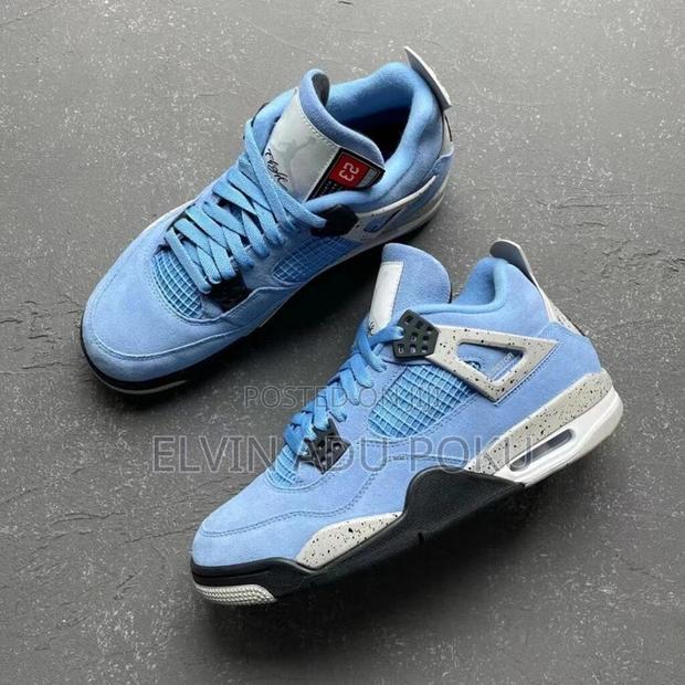 Air Jordan 4 Retro “ University Blue “ Sneakers · Photo 1